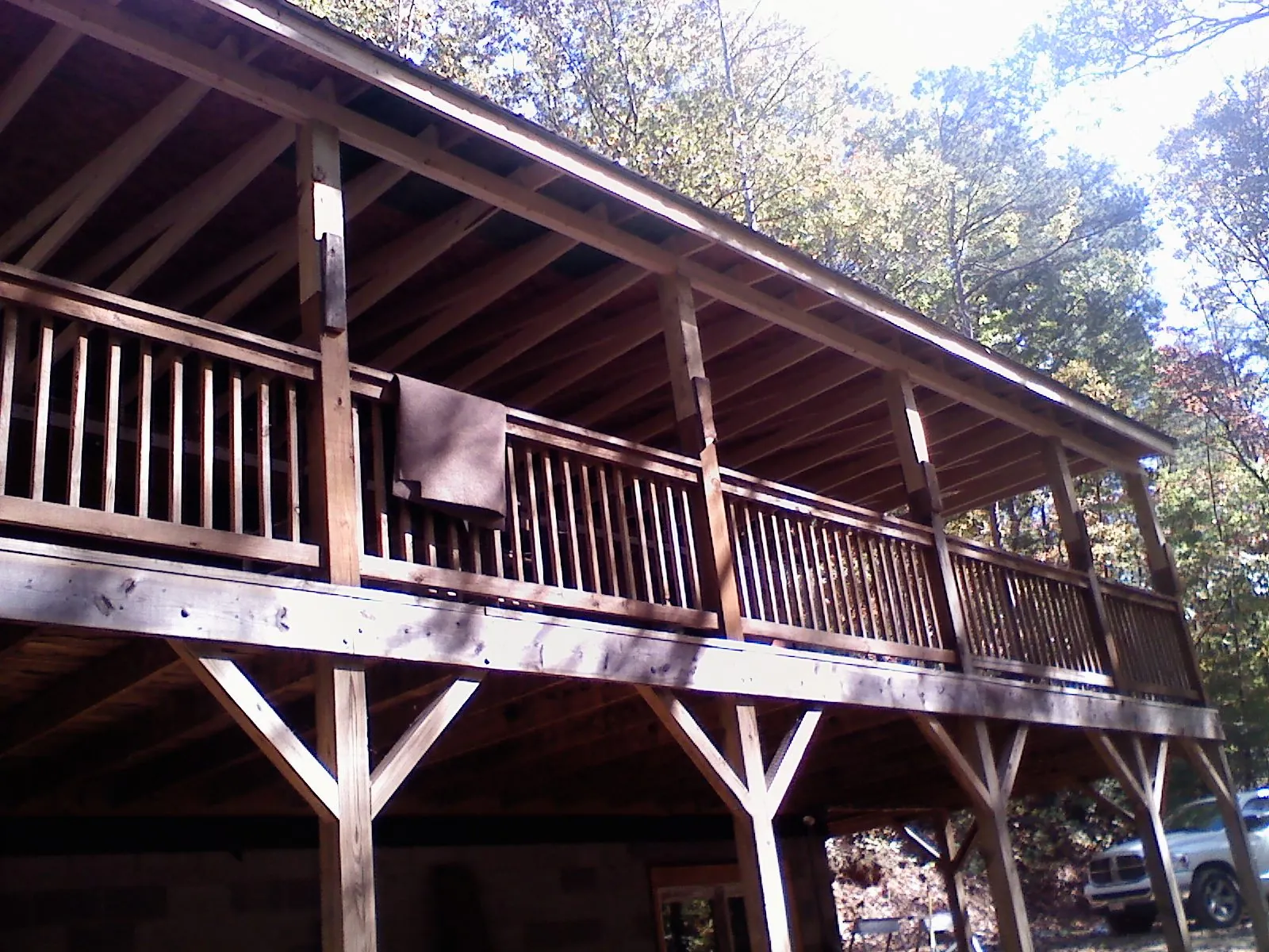 Timber framing under a new elevated porch and deck — Roof Leak Repair in Bellows Falls by Roofing Brothers